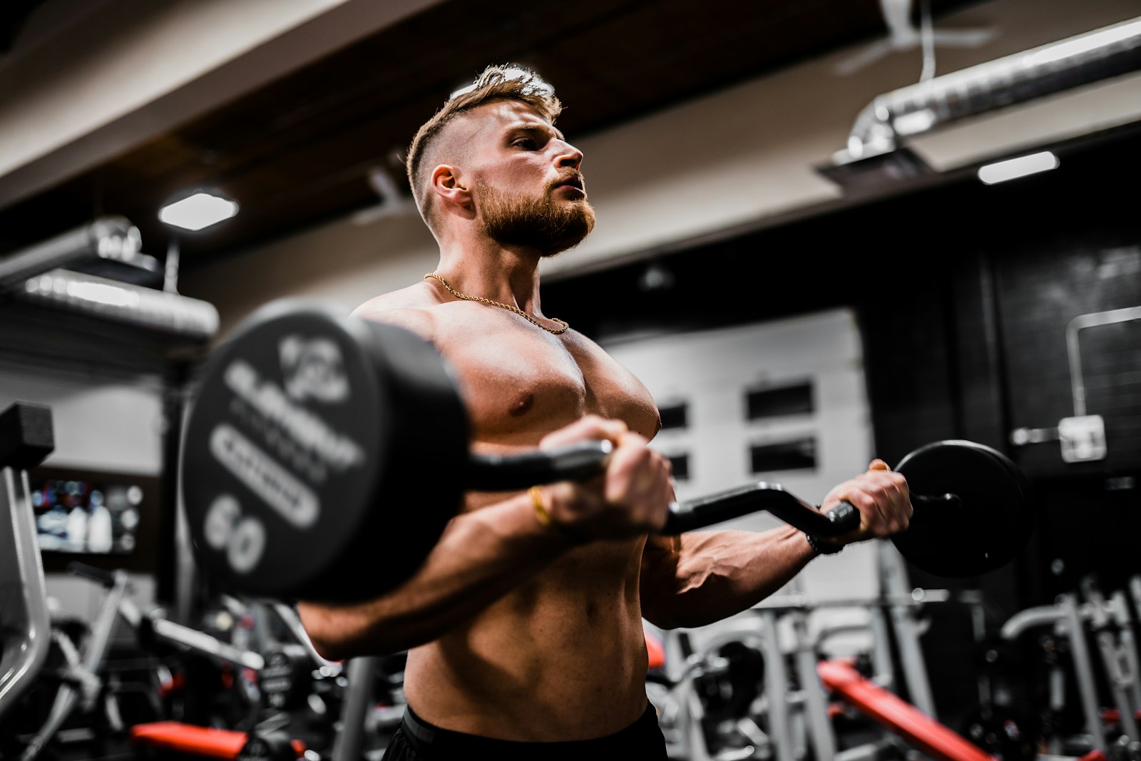Exhausted athlete muscle fatigue recovery after hard workout